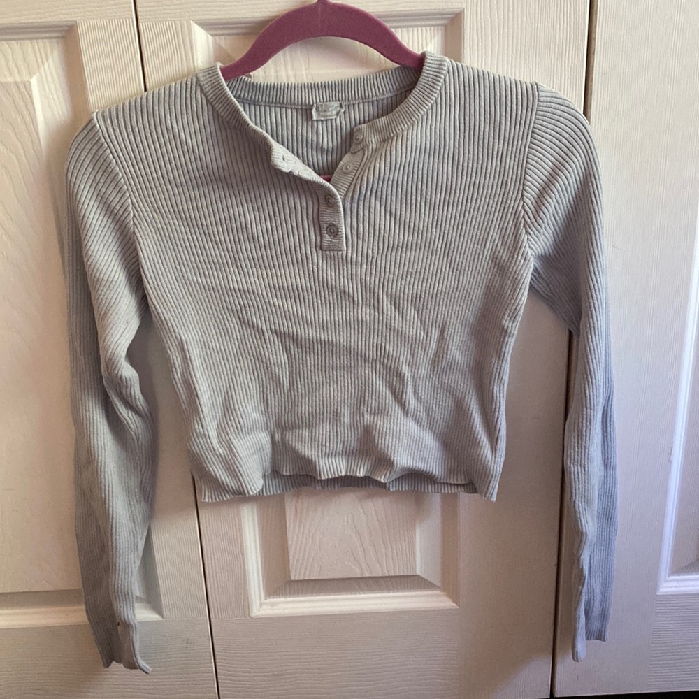 A blue grey cropped sweater